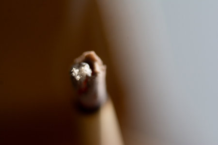 Close up of a pencil sharpened with a shallow depth of fieldの写真素材