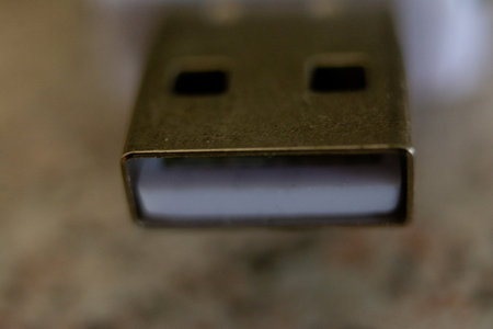 Close up of USB flash drive on a table. Selective focus.の写真素材
