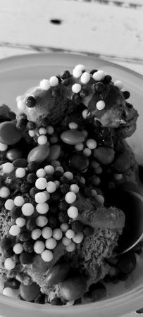 Chocolate cake with chocolate sprinkles on top. Black and white.の写真素材