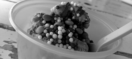 Chocolate ice cream in a plastic cup. Black and white.の写真素材