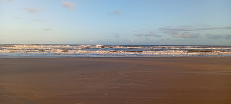 Panoramic view of the beach at sunsetの写真素材