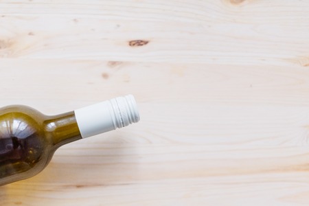 Bottle of red wine on the desk tableの写真素材