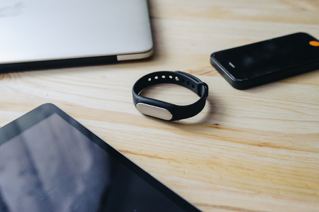 Digital time. Busines devises. Laptops, tablets, fitnes tracker and mobile phonesの写真素材
