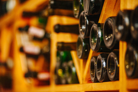 Wine cabinet with bottles and glasses. Daylight