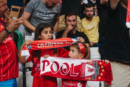 ISTANBUL, TURKEY - AUGUST 14, 2019: Fans of Liverpool FC in Vodafone Arena during the football match of the UEFA Super Cup Liverpool - Chelseaのeditorial素材