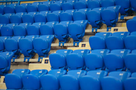 Empty blue seats in the stadiumの写真素材