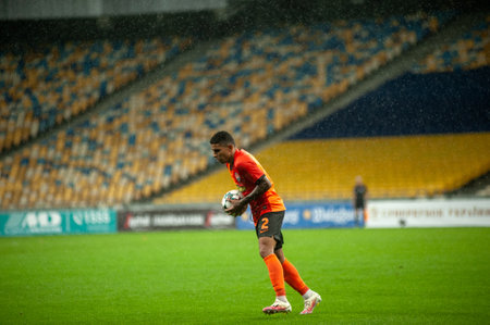 KYIV, UKRAINE - AUGUST 25, 2020: Dodo defender of FC Shakhtar Donetsk in attack during the raining match of Ukrainian Super Cup vs FC Dynamo Kyivのeditorial素材
