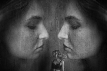 Blond woman in black lingerie. Double exposure photo. Art of photography
