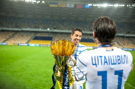 Kyiv, Ukraine - August 25, 2020: Carlos De Pena, defender of Dynamo Kyiv with trophy celebrating win in the match Ukrainian Super Cup Shakhtar - Dynamoのeditorial素材