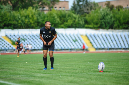 Kharkiv, Ukraine - September 06, 2020: Rugby match of Ukrainian league Olymp - Kredo-63. Beautiful key moment of the game. Powerful athletes playing rugby match. Rugby-15 Ukrainian Championship.のeditorial素材