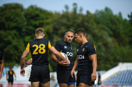 Kharkiv, Ukraine - September 06, 2020: Rugby match of Ukrainian league Olymp - Kredo-63. Beautiful key moment of the game. Powerful athletes playing rugby match. Rugby-15 Ukrainian Championship.のeditorial素材