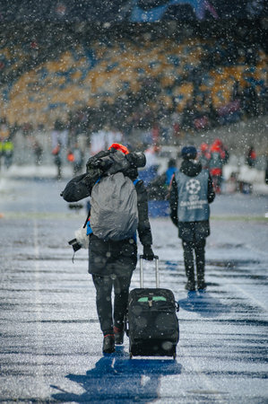 Kyiv, Ukraine - December 12, 2018: Football photographer during the UEFA Champions League match between Shakhtar Donetsk vs Olympique Lyonのeditorial素材