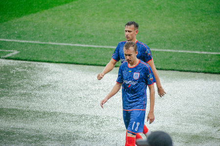 Kharkiv, Ukraine - October 5, 2019: Match of the Ukraine profesional league Metallist 1925 - Mykolaiv. Raining sport dayのeditorial素材