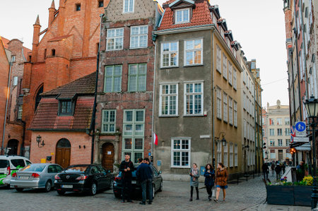 Gdansk, Poland - April 17, 2019: Old street, typical decorative medieval tenement houses in Gdansk