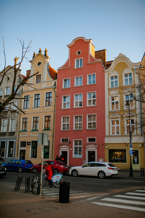 Gdansk, Poland - April 17, 2019: Old street, typical decorative medieval tenement houses in Gdansk