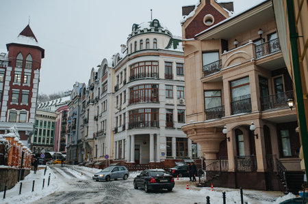 Kyiv, Ukraine - December 13, 2018: Old modern historic upscale town colorful street buildings of Kiev city in Podil, the luxury neighborhood of Vozdvyzhenka imulticolored housesのeditorial素材
