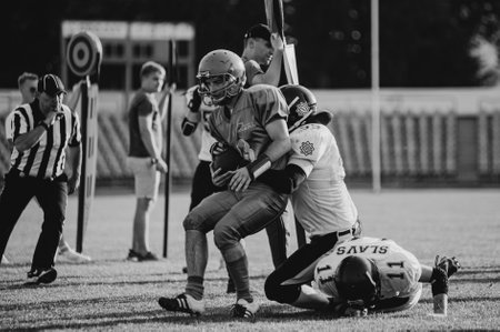 KHARKIV, UKRAINE - SEPTEMBER 26, 2020: American football players in action during match of Ukrainian Super League Atlantes Kharkiv vs. Slavs Kyivのeditorial素材