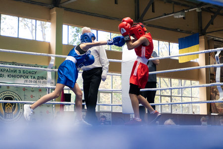 KHARKIV, UKRAINE - OCTOBER 2, 2020: Girls boxers in the fight on the ring during the Ukraine Women Champion Cup 2020のeditorial素材