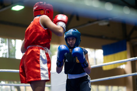 KHARKIV, UKRAINE - OCTOBER 2, 2020: Girls boxers in the fight on the ring during the Ukraine Women Champion Cup 2020のeditorial素材