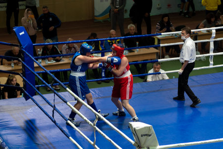KHARKIV, UKRAINE - OCTOBER 1, 2020: Girls boxers in the fight on the ring during the Ukraine Women Champion Cup 2020のeditorial素材