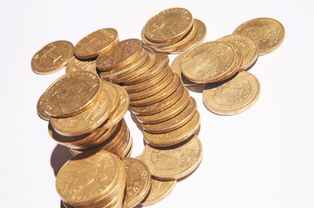Ukrainian coin stacks on a light background