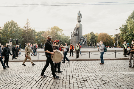 KHARKIV, UKRAINE - OCTOBER 14, 2020: Members of nationalist organizations, Ukrainian veterans of Russian-Ukrainian war, volunteers and relatives of soldiers, who were injured on war on Eastern Ukraine during march in Kharkivのeditorial素材