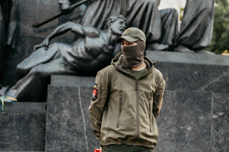 KHARKIV, UKRAINE - OCTOBER 14, 2020: Members of nationalist organizations, Ukrainian veterans of Russian-Ukrainian war, volunteers and relatives of soldiers, who were injured on war on Eastern Ukraine during march in Kharkivのeditorial素材