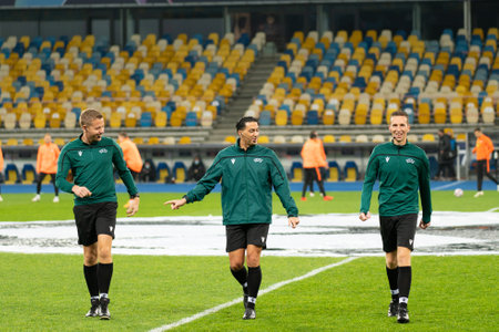 KYIV, UKRAINE - NOVEMBER 3, 2020: Referee team Serdar GÃ¶zÃ¼bÃ¼yÃ¼k, Joost Van Zuilen, Johan Balder in action during the football match of Group B of UEFA Champions League FC Shakhtar vs Borussia MÃ¶nchengladbachのeditorial素材