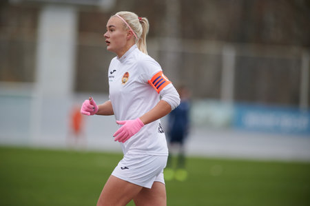 KHARKIV, UKRAINE - NOVEMBER 11, 2020: Woman football match Zhitlobud-2 vs. Voshod. There is lockdown sport. Public events are allowed. Europe match of football during CV pandemic.のeditorial素材