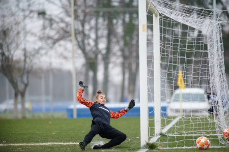 KHARKIV, UKRAINE - NOVEMBER 20, 2020: The football match of Ukrainian Football match of Ukraine league Zhitlobud-1 - Nika at Sport camp of Metallist without fans.のeditorial素材