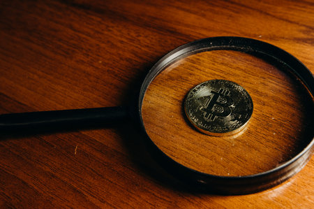 The golden coin with bitcoin symbol background.の写真素材