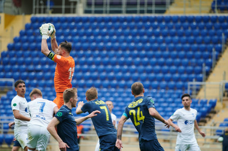 KHARKIV, UKRAINE - APRIL 14, 2021: The football match of Professional football league. FC Metal Kharkiv vs FC Peremohaのeditorial素材