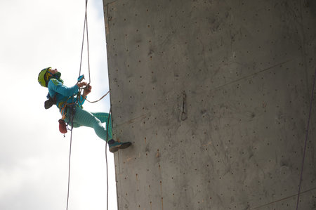 KHARKIV, UKRAINE - APRIL 24, 2021: Participant of the Ukrainian Championship of climbing festival.