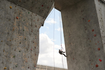 KHARKIV, UKRAINE - APRIL 24, 2021: Participant of the Ukrainian Championship of climbing festival.