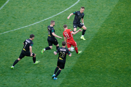 KHARKIV, UKRAINE - MAY 16, 2021: The football match of PFL Metalist 1925 vs Veresのeditorial素材