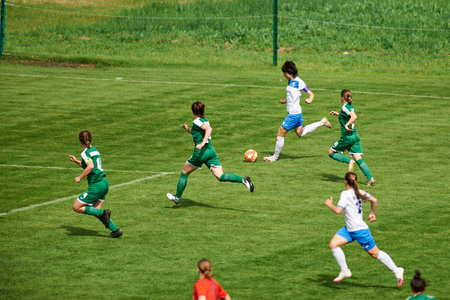 KHARKIV, UKRAINE - MAY 29, 2021: Woman football match Zhilstroi-2 vs. Karpaty. Public events are...