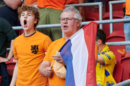 AMSTERDAM, NETHERLANDS - JUNE 13, 2021: Fans of Netherlands. EURO 2020. The football match Netherlands vs Ukraineのeditorial素材