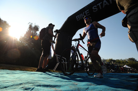 KHARKIV, UKRAINE - AUGUST 1, 2021: Athlet at the Iron Way Triathlon 2021 competitions.のeditorial素材