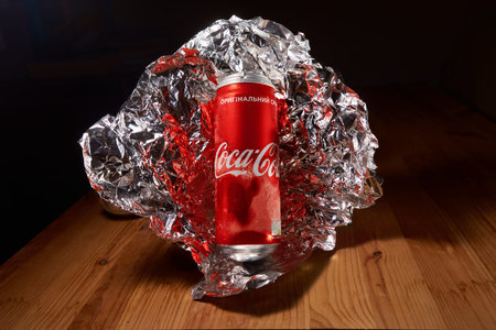 KHARKIV, UKRAINE - DECEMBER 14, 2021: A can of Coca Cola drink. The drink is produced and...