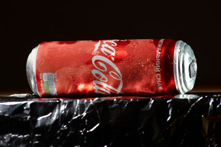 KHARKIV, UKRAINE - DECEMBER 14, 2021: A can of Coca Cola drink. The drink is produced and...