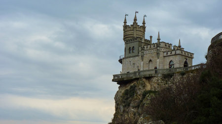 The rocky shore of the black sea in January. The famous place of Crimea Castle Swallowのeditorial素材
