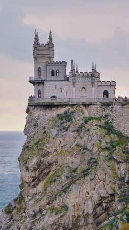 The rocky shore of the black sea in January. The famous place of Crimea Castle Swallowのeditorial素材