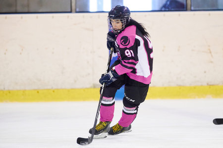 KHARKIV, UKRAINE - FEBRUARY 6, 2022: The match of Female hockey league UHL. Game between female...