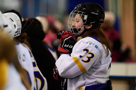 KHARKIV, UKRAINE - FEBRUARY 5, 2022: The match of Female hockey league UHL. Game between female...