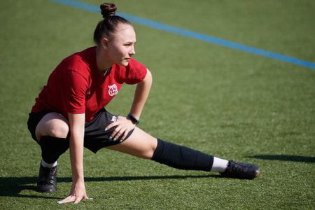 GERMANY, COLOGNE - MARCH 23, 2022: Open training of Ukrainian women football team Krivbas. Footballers migrants from Ukraine because of russia's attack their Motherlandのeditorial素材