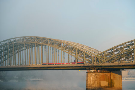 Cologne, Germany - December 16, 2022: Frozen and fog. The Hohenzollern bridge over Rhine river.のeditorial素材