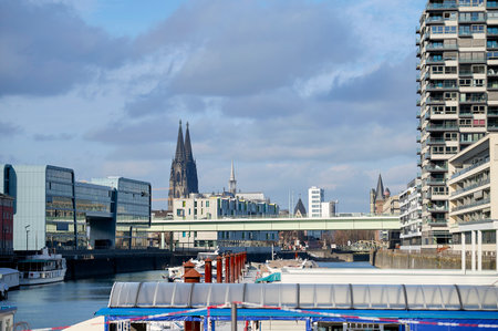 COLOGNE, GERMANY - 5 FEBRUARY, 2024: Rheinauhafen. Waterfront promenade with modern, dramatic buildingsのeditorial素材