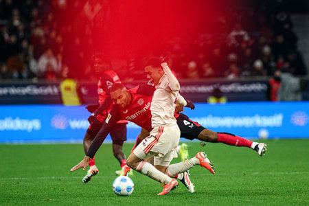 LEVERKUSEN, GERMANY - 15 FEBRUARY, 2025: Jonathan Tah, Jamal Musiala, The Bundesliga match FC Bayer 04 Leverkusen vs FC Bayern Muenchen at BayArenaのeditorial素材