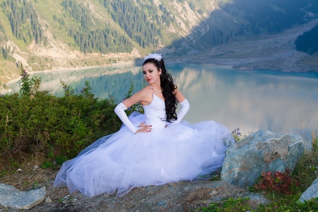 sexy beautiful woman bride in her wedding dress  on mountain in Almaty, Kazakhstan, More of this series on my portfolio !の写真素材