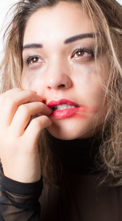 asian woman crying on  isolated white backgroundの写真素材